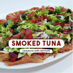Smoked wild tuna carpaccio with red fruits and salads